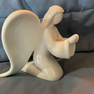 Holben designs praying angel